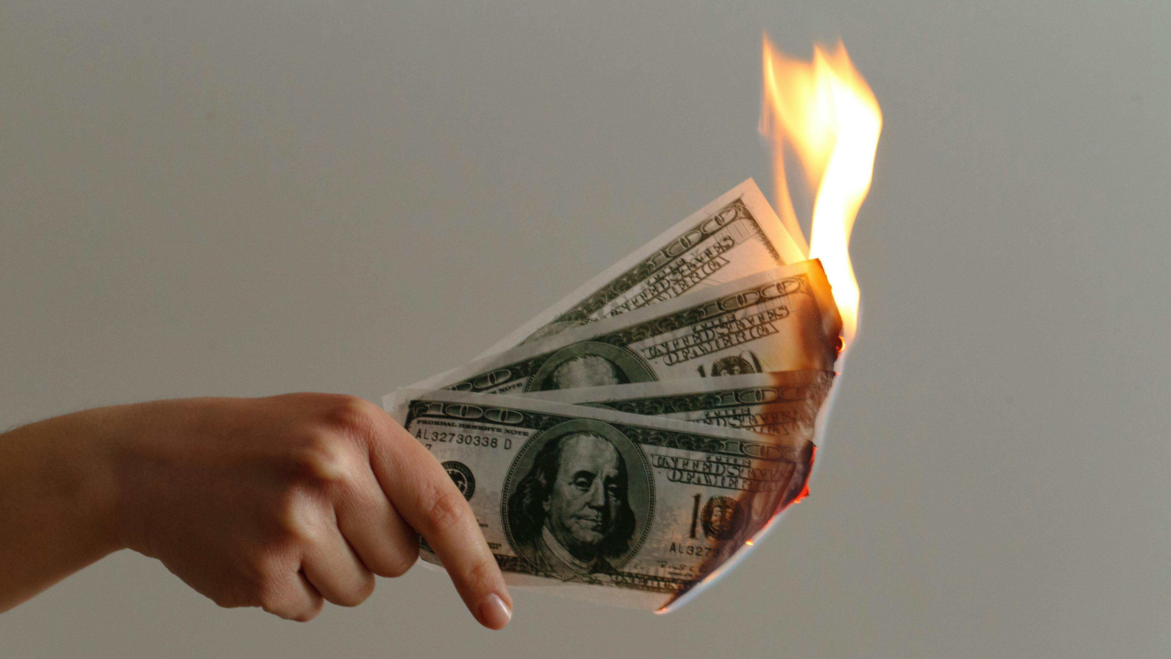 Image of money being burned